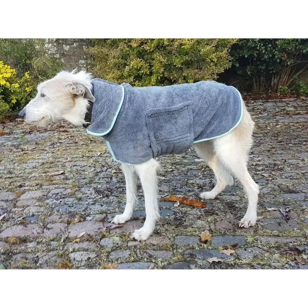 Gray plush dog towel with light blue trim and front pocket from henry wag drying coat that removes water fast
