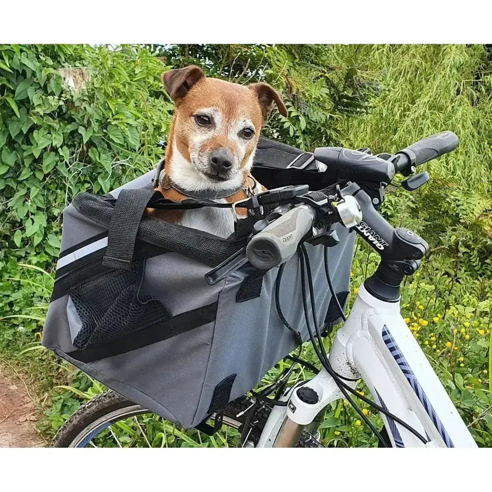 Gray and black mesh henry wag pet panier dog carrier mounted on bicycle handlebar for pet panier bike use
