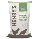 White and green bag of henry’s original layer pellets with brown chicken silhouettes for poultry feed