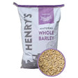 A white and purple 20kg bag of henrys whole barley with bold black lettering and farm silhouette for horse feed