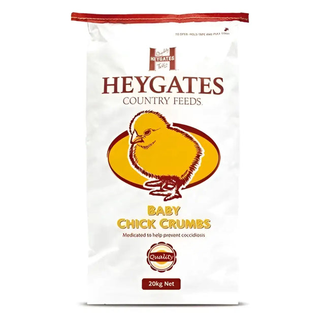 White bag of heygates baby chick crumbs feed with yellow chick illustration and red accents 20kg net weight