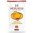 White bag of heygates country chick crumbs chicken feed with yellow chick illustration and red accents on the front