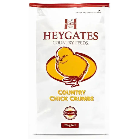 White bag of heygates country chick crumbs chicken feed with yellow chick illustration and red accents on the front