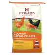 A 20kg bag of heygates country layers pellets in orange and white packaging for free-range poultry feed