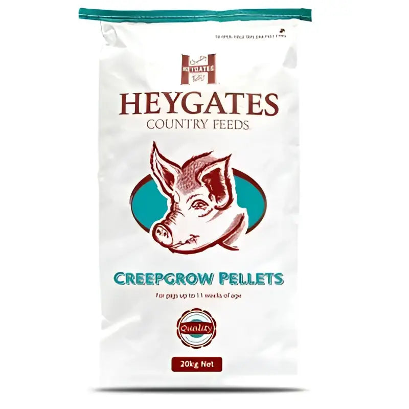 White bag of heygates pig creepgrow pellets with teal and brown pig illustration for pig feeding