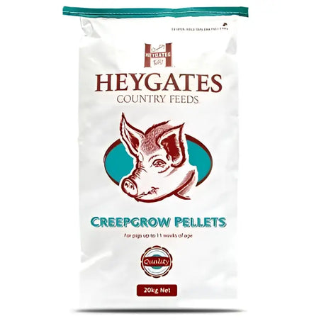 White bag of heygates pig creepgrow pellets with teal and brown pig illustration for pig feeding