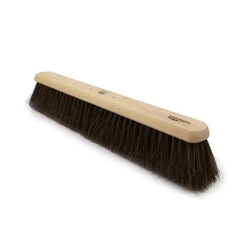 A hillbrush industrial medium platform broom head with a sturdy light wooden handle and dense dark brown bristles