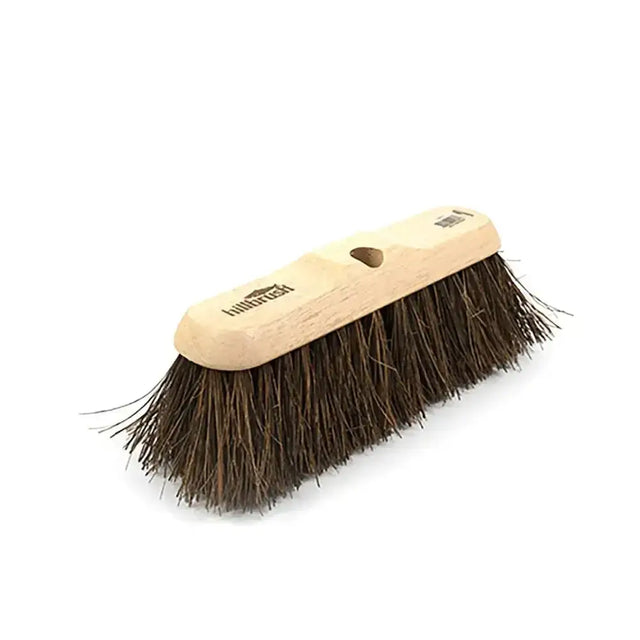 A hillbrush medium sweeping broom head with a sturdy light wooden handle and dense dark brown broom head bassine bristles