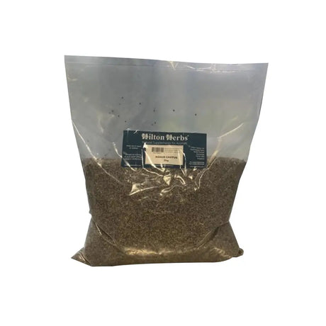 A clear plastic bag of dark brown dried agnus castus monk’s pepper pieces labeled hilton herbs 50g