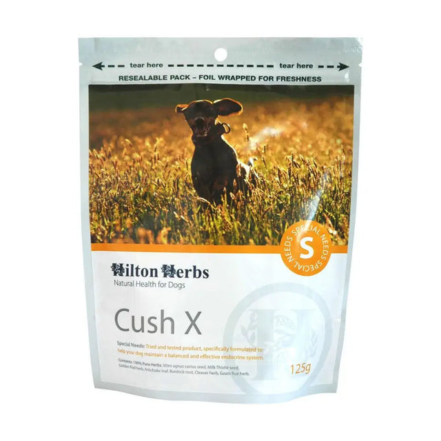 A 125g resealable foil pack of hilton herbs cushx hormonal supplements featuring a black dog in golden grass