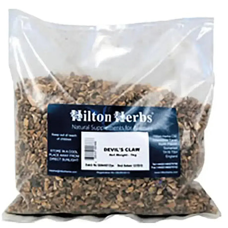A clear plastic bag of brown chopped devil’s claw root natural supplement by hilton herbs for equine mobility