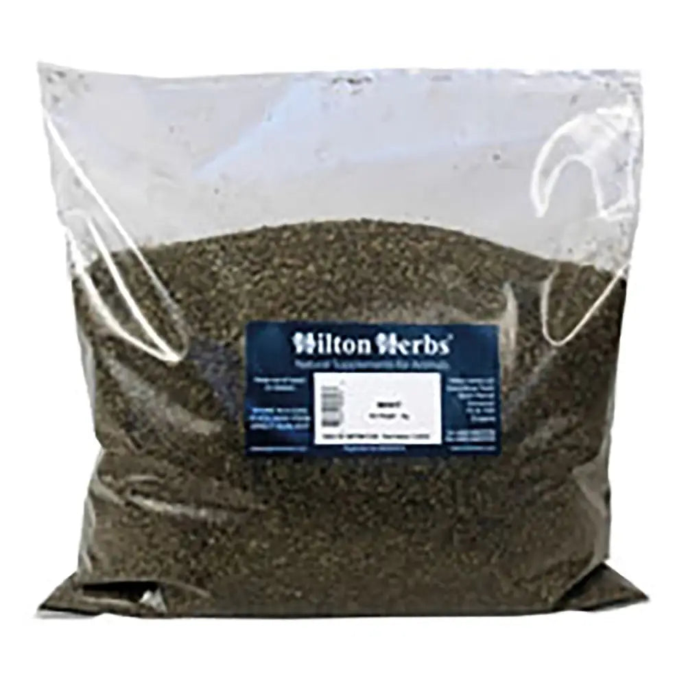A clear plastic bag of dark green dried herbs labeled hilton herbs mint for herbs mint soothing and digestive use