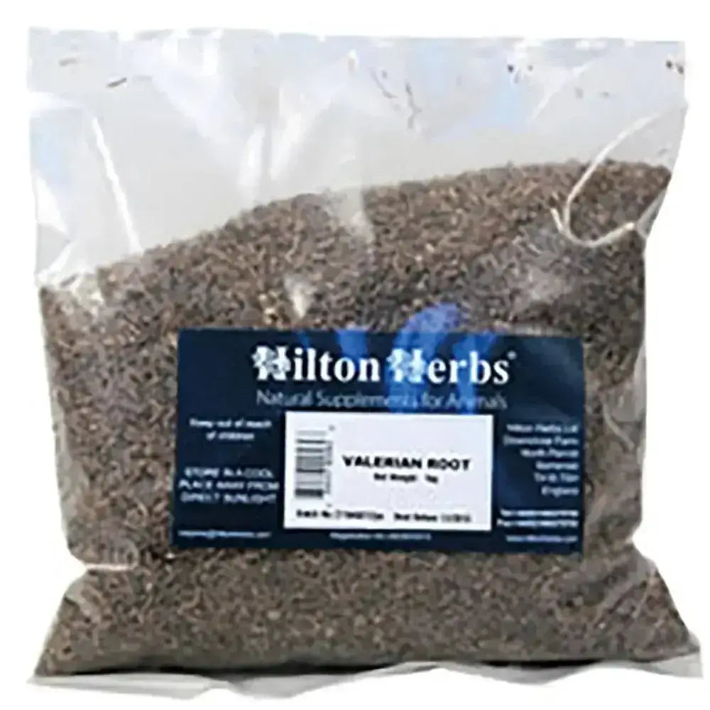 A clear plastic bag with dark brown chopped valerian root herbs for horse supplements valerian by hilton herbs valerian