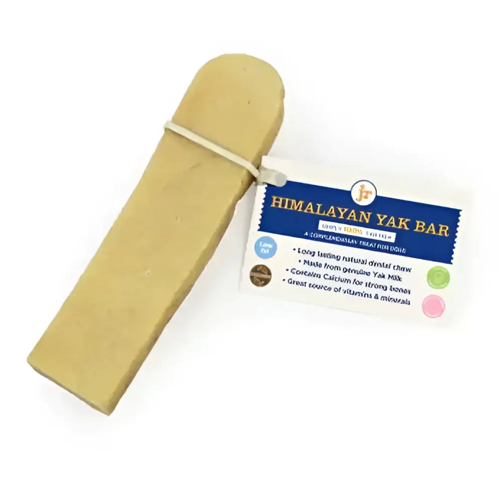 A pale yellow rectangular himalayan yak bar dog treat made from genuine yak milk rich in amino acids