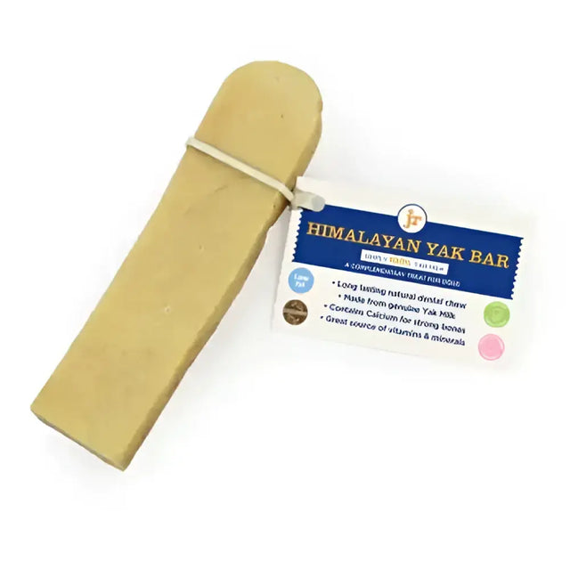 A pale yellow rectangular himalayan yak bar dog treat made from genuine yak milk rich in amino acids