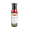 A glass bottle of hogs bottom smokin jones bbq sauce 250ml with a silver cap and a label featuring green foliage and butterflies