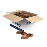 Brown air dried chicken liver dog treats in a white and blue hollings pig ears box for longer lasting chews