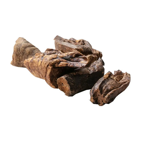 Dark brown irregular chunks of simply air dried pure beef jerky from hollings pure beef product