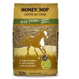 A 12.5kg bag of honeychop chopped oat straw feed with golden yellow and green label showing a horse in motion