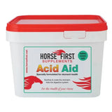 White plastic bucket with red lid and horse first acid aid label showing key ingredients for healthy digestive tract