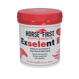 Red-lidded white container of horse first exselent e supplement with selenium and vitamin e to aid muscle well-being