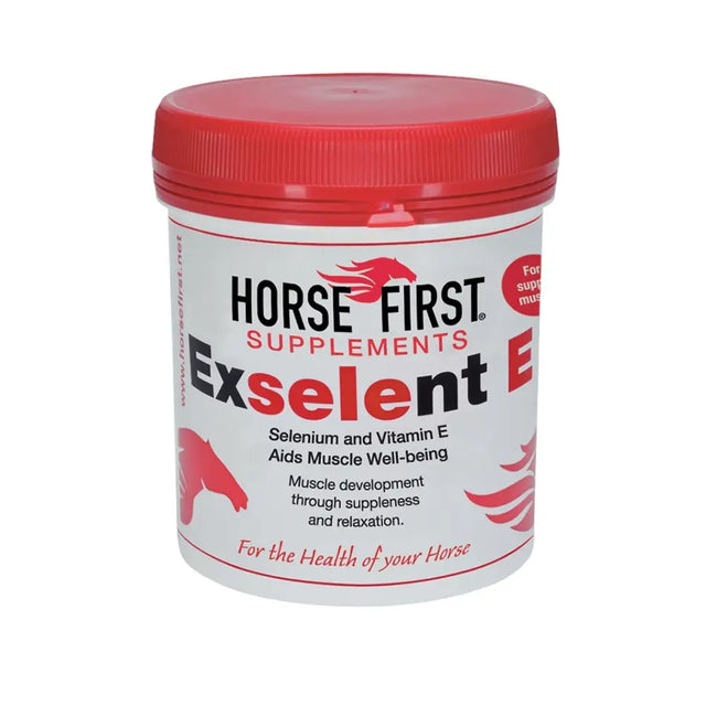 Red-lidded white container of horse first exselent e supplement with selenium and vitamin e to aid muscle well-being