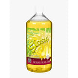 A clear plastic bottle of yellow horse health citronella slosh ideal summer non-rinse wash for a fly-free coat