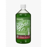 A clear plastic bottle of green muscle slosh invigorating body wash with white cap for horse health muscle care