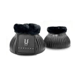 Black horsena pro-light reach boots with plush faux fur lining and ribbed design for over reach protection