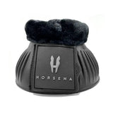 Black horsena pro-light reach boot with plush faux fur lining and textured ribbed exterior shown from the back side