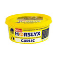 Yellow plastic container of horslyx garlic balancer mini garlic balancer horse treat for healthy horses