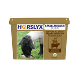 Brown plastic horslyx smallholder block container with a sheep eating from a tray for smallholders mineral block use
