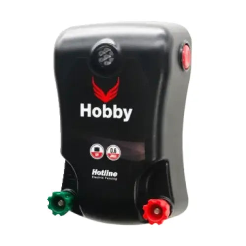 Black plastic hotline hobby electric fencing transmitter with red green connectors and external battery input for better battery life