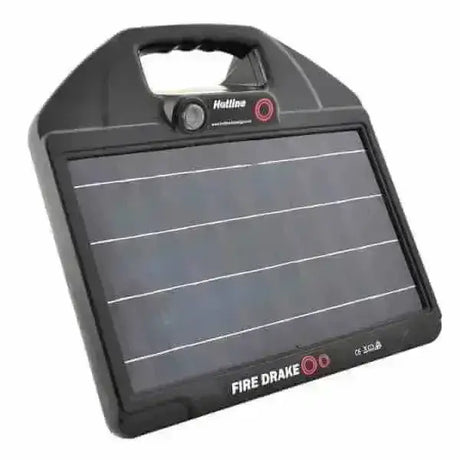 Black plastic hotline solar electric fence energizer with handle labeled fire drake by hatties for solar powered fence use