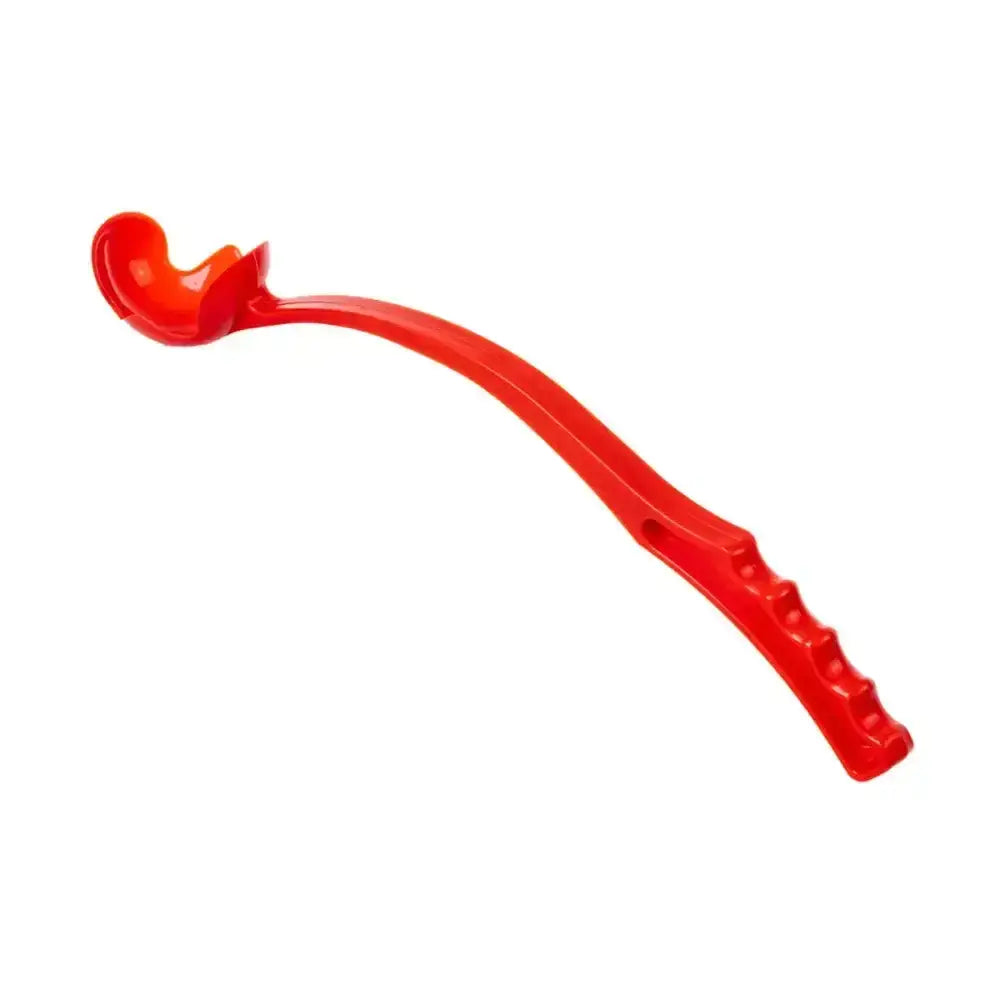 Bright red plastic toy spoon with textured grip handle for paws ball launcher and christmas tennis ball play