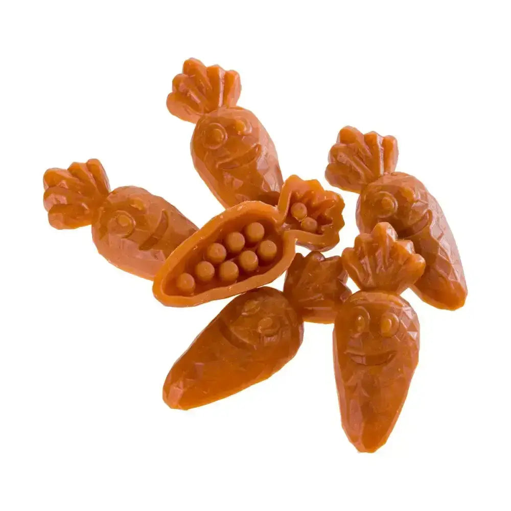 Orange carrot shaped soap bars with carved faces and leafy tops for paws christmas chew rawhide chew use