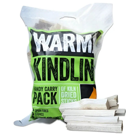Green and black packaged bag of hutton mill kiln dried kindling bags with warm dried kindling sticks inside