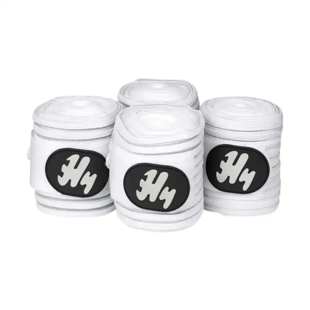 White horse hy air flow bandage rolls with black h logos are fully ventilating bandages for horses