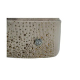 Beige textured belt with gold and silver rhinestones and a metallic logo on the equestrian alaska diamante bobble hat