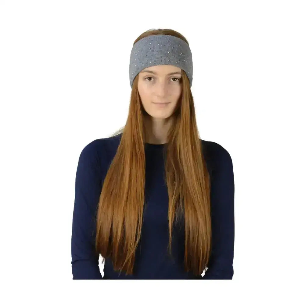 Woman wearing gray equestrian alaska diamante headband with subtle glittery close knit texture