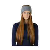 Woman wearing gray equestrian alaska diamante headband with subtle glittery close knit texture
