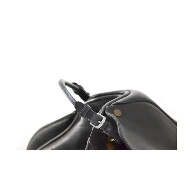 Black leather handbag with silver buckle and curved top handle featuring high quality rolled leather balance strap