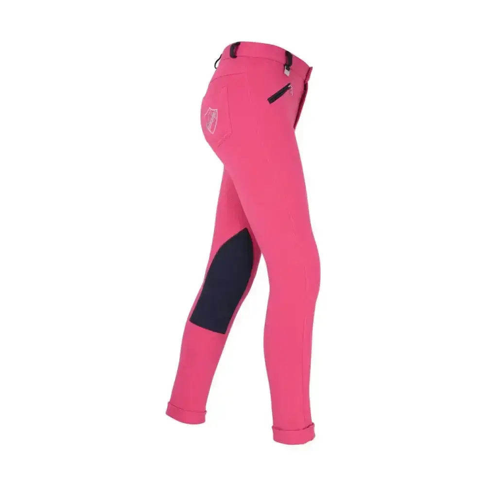 Back view of bright pink equestrian belton children jodhpurs with black knee patches and white logo on pocket