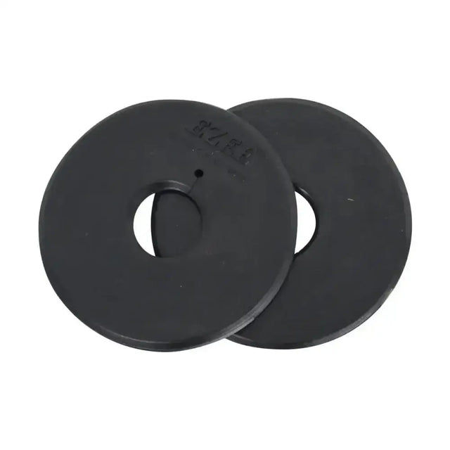 Black rubber equestrian bit guards with central hole and embossed markings designed to protect horse’s mouth