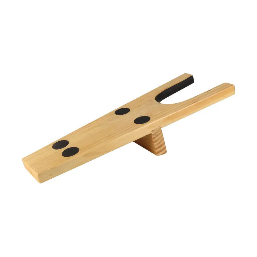 Light wood equestrian boot jack with black rubber grips and small triangular base for easy muddy boots removal