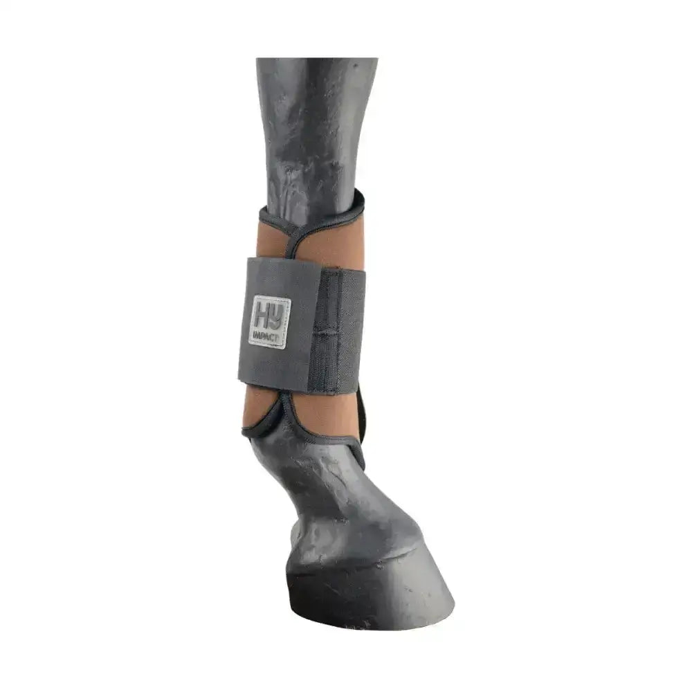 Gray hu brand equestrian brushing boots with black and tan accents designed for horse ankle protection