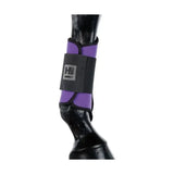 Purple and black equestrian brushing boots with gray strap featuring hu distinct logo for horse ankle protection