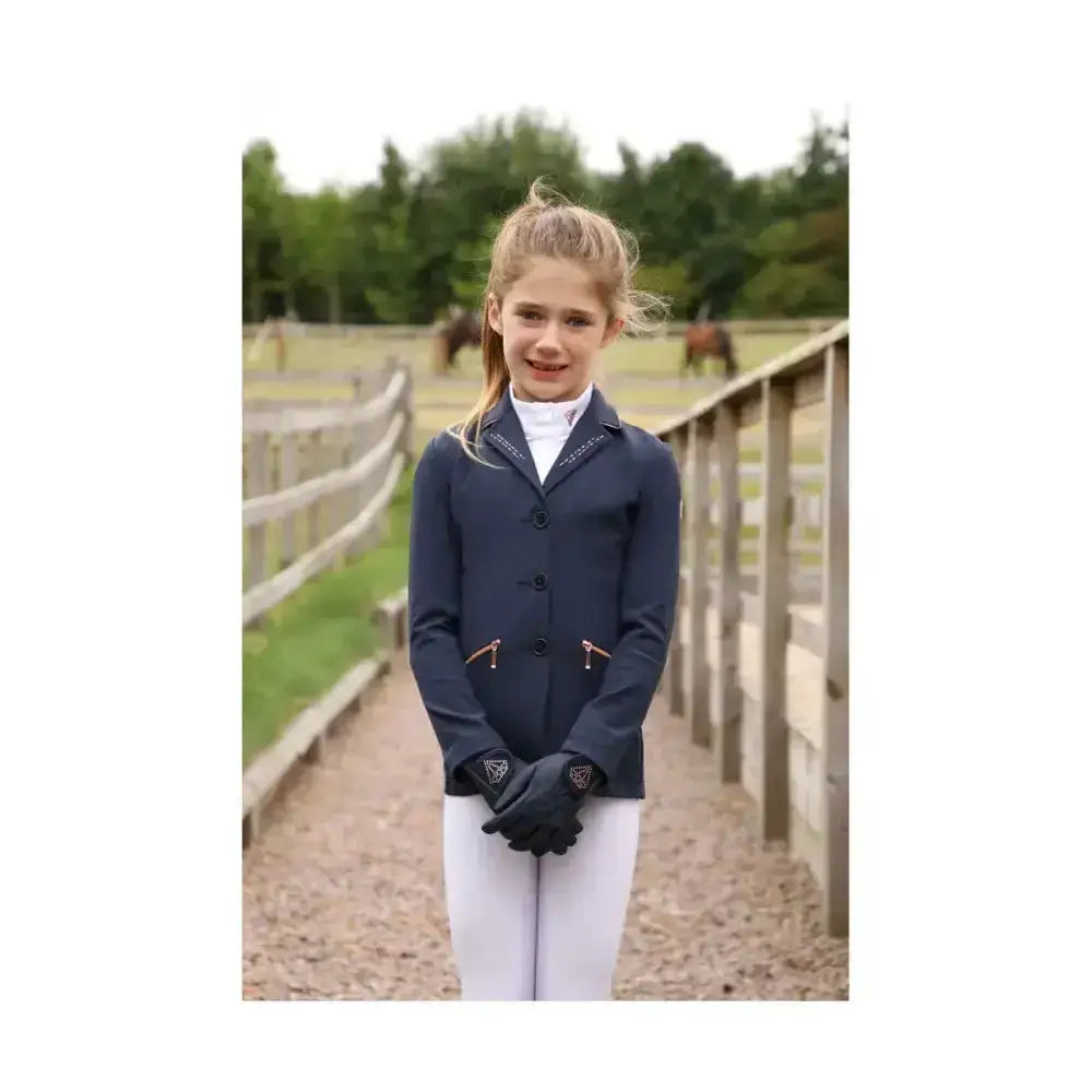 Navy blue hy equestrian cadiz mizs show jacket with glittering diamantes paired with black gloves and white pants