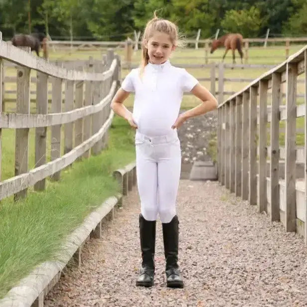 White fitted riding pants with subtle stitching details perfect for equestrian cadiz mizs show looks