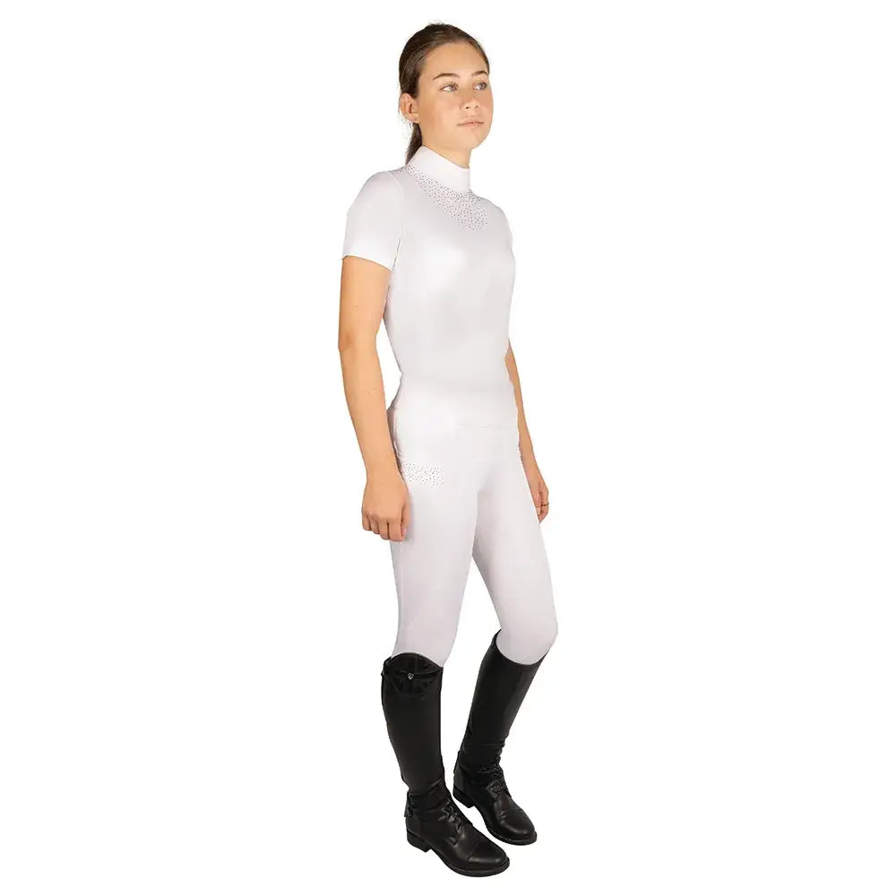 White equestrian children’s roka regal riding suit with short sleeves high collar and subtle chest and thigh embellishments